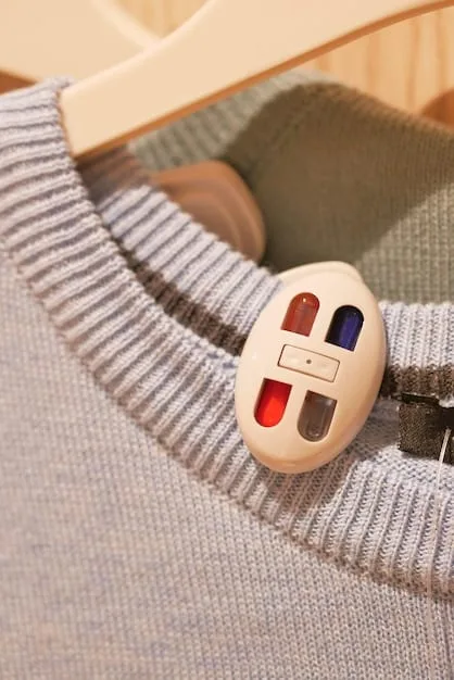 A close-up shot of a capsule wardrobe, highlighting the texture and quality of the essential clothing items: a cashmere sweater, a pair of well-fitted jeans, a crisp white shirt, and a classic trench coat. The items are neatly folded and hung in an organized fashion.