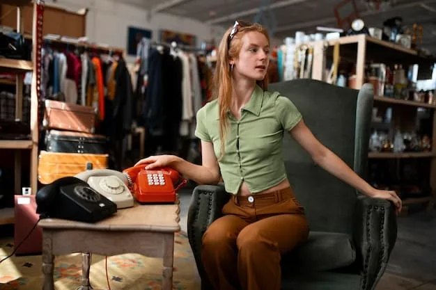 A woman browsing through a well-organized vintage clothing rack at a thrift store. The clothes are a mix of styles and colors, and the setting is bright and inviting. The woman is smiling as she examines a garment, conveying the excitement of finding a unique and affordable fashion piece.