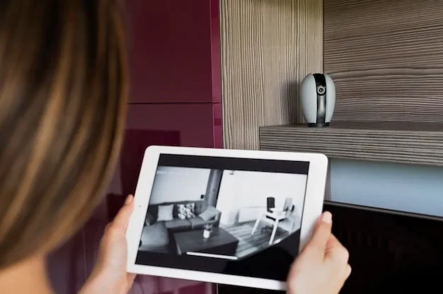A close-up of a sleek, modern smart home security control panel with a user-friendly touchscreen interface displaying security camera feeds and system settings.