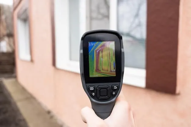 An image showing a thermal imaging camera pointed at a house, clearly indicating areas of heat loss (red and yellow) and areas of good insulation (blue and green). The image should highlight specific areas like windows, walls, and the roof.