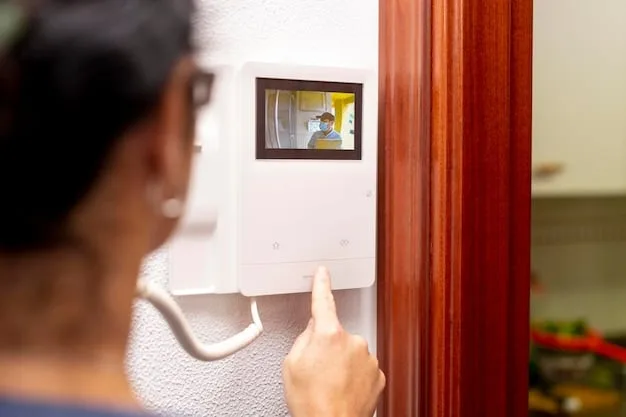 A close-up of a smart doorbell camera capturing a clear image of a person at the door. The camera is sleek and modern, blending seamlessly with the doorframe. The image quality is high, showcasing the advanced facial recognition capabilities of the system.