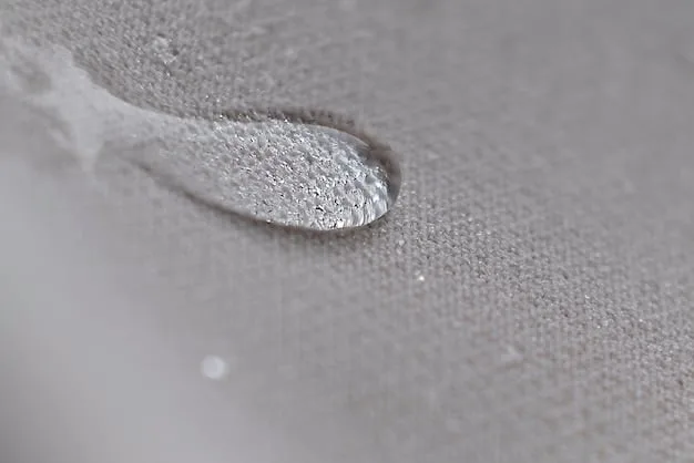 A detailed fabric swatch showing a moisture-wicking material with visible micro-perforations under a magnifying glass, symbolizing breathability.